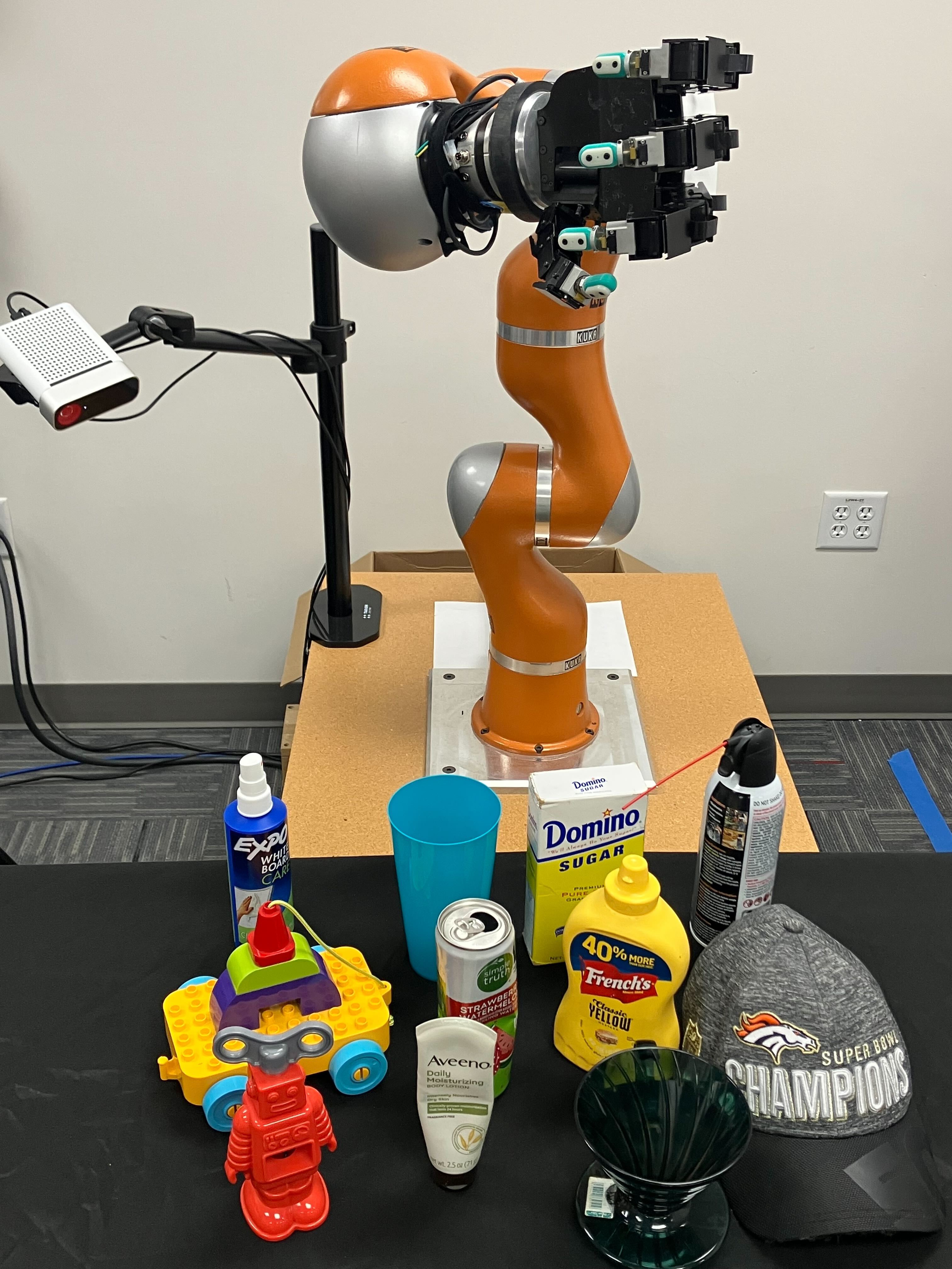 Robot platform and real-world test objects of varying shape, size, mass, rigidity, and opaqueness.